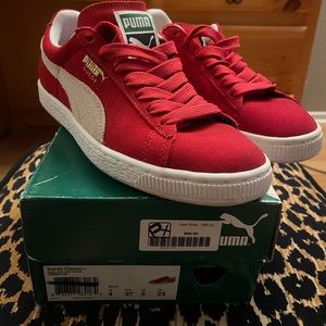 Red suede classic pumas